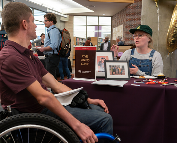 students at Civil Rights Clinic table