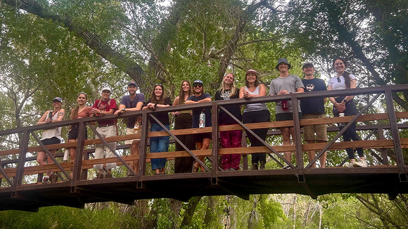 article_inset_800x600_ELC-2025-group-photo.png Members of Environmental Law Clinic leaning against rails of bridge with trees in background