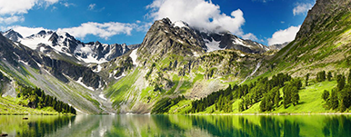 photo of mountains and lake