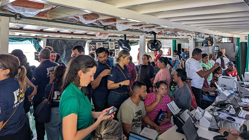 individuals participating online activities on a boat